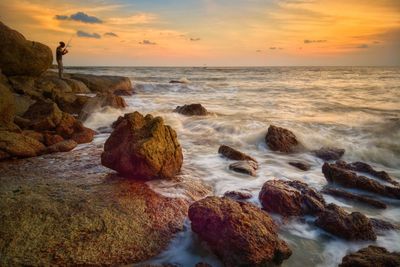 Scenic view of sea against sky during sunset