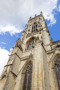 Low angle view of york minster against sky