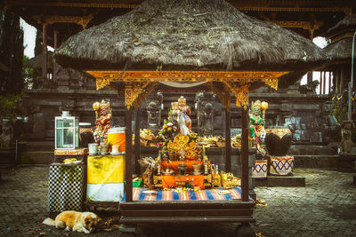 Statue in temple outside building