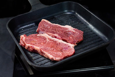 Close-up of meat on barbecue grill