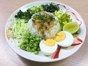 High angle view of salad in plate on table