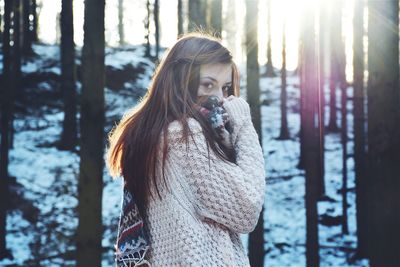 Young woman standing outdoors