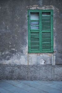 Closed window of old building