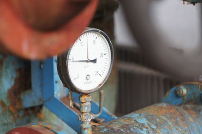 Close-up of gauge on machinery