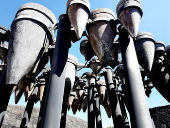 Low angle view of metal structure against sky