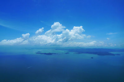 Scenic view of sea against blue sky