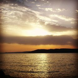 Scenic view of sunset over sea