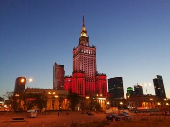 View of city buildings at night