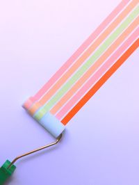 Close-up of colored pencils on white background