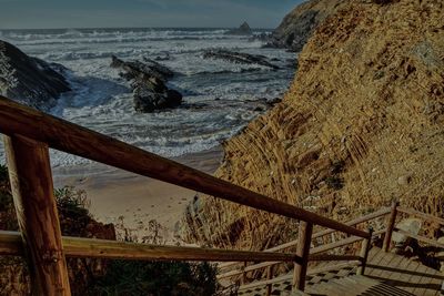 High angle view of sea shore against sky