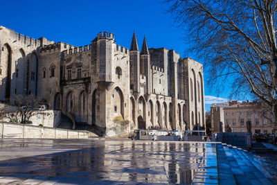 View of swimming pool against buildings