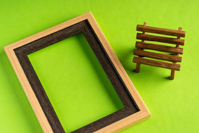 High angle view of green table against blue background