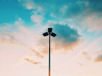 Low angle view of street light against sky