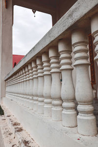 Architectural columns of building against sky