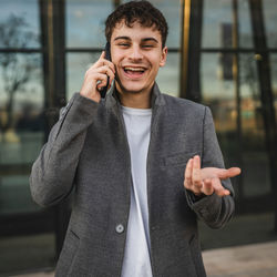 Young man using mobile phone