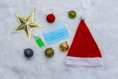 High angle view of christmas decoration on snow