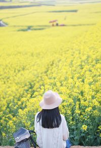 Rear view of a woman in the countryside