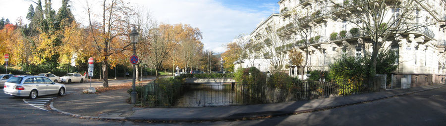 Cars on road against sky