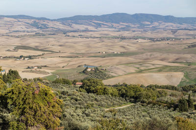 High angle view of field against mountains