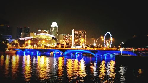 Illuminated buildings at waterfront