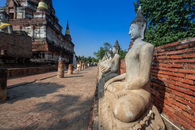 Statue of historic building against sky