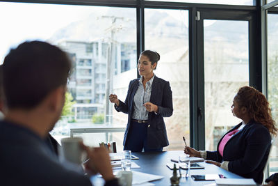 Business colleagues having discussion at office