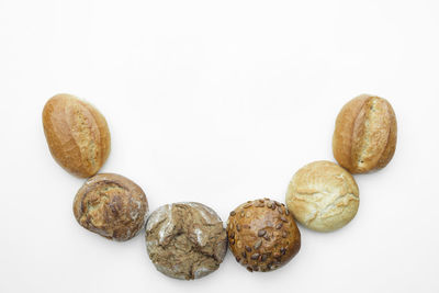 Close-up of eggs against white background