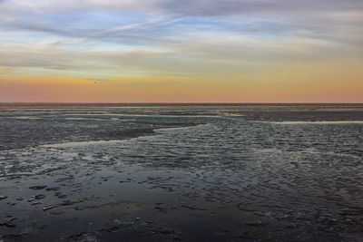 Scenic view of sea during sunset