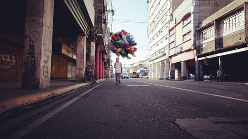 People walking on street in city