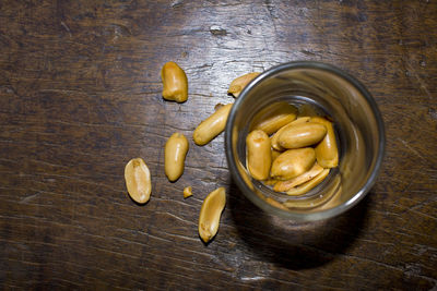 High angle view of fruits in jar on table