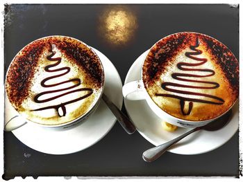 Close-up of cappuccino on table