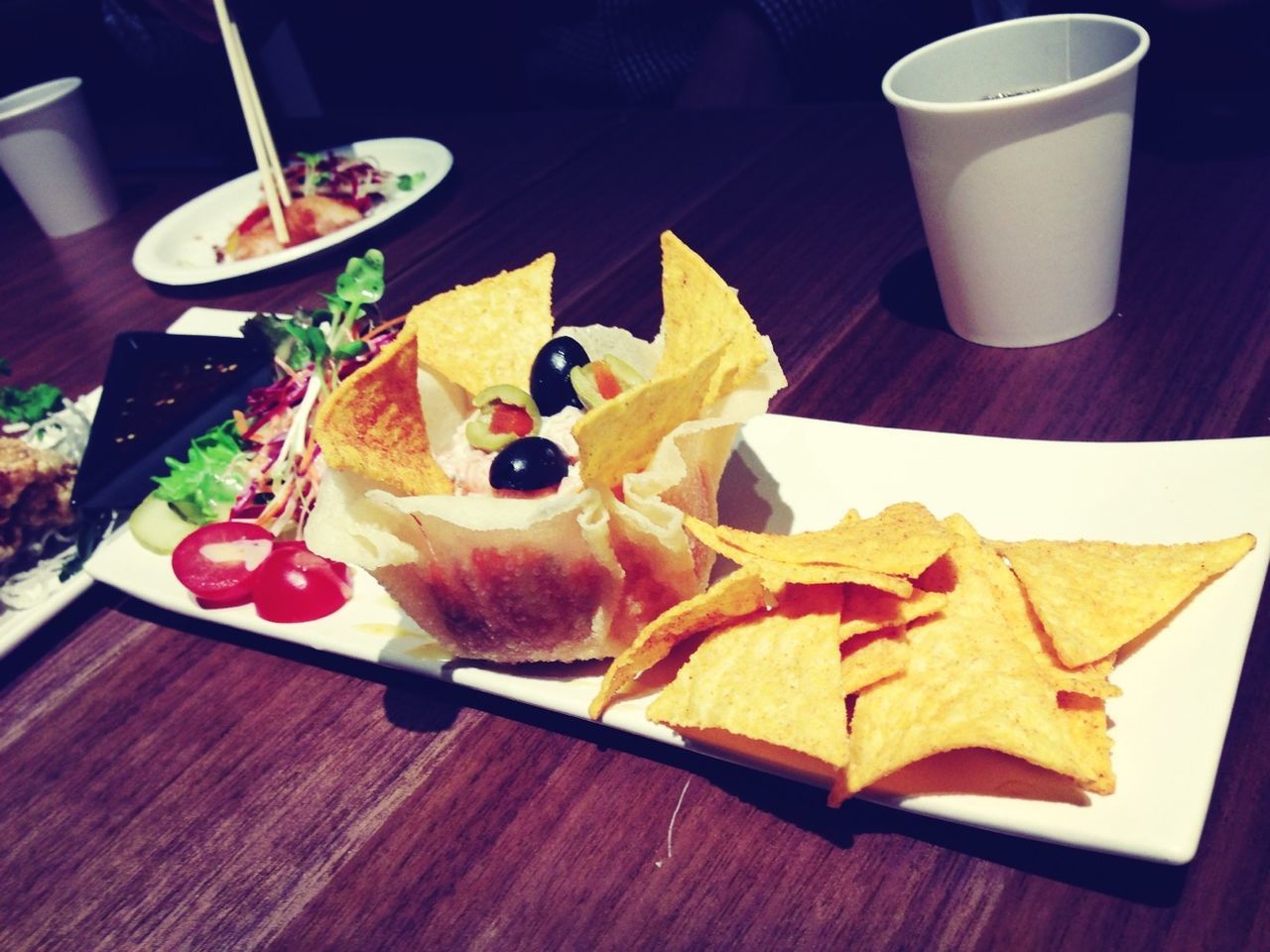 table, indoors, food and drink, freshness, still life, drink, food, sweet food, refreshment, ready-to-eat, plate, dessert, indulgence, drinking glass, close-up, unhealthy eating, high angle view, coffee cup, serving size, cake