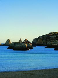 Scenic view of sea against blue sky