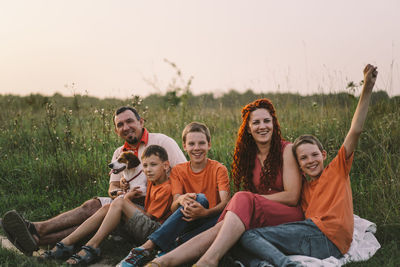 Portrait of a family in nature.