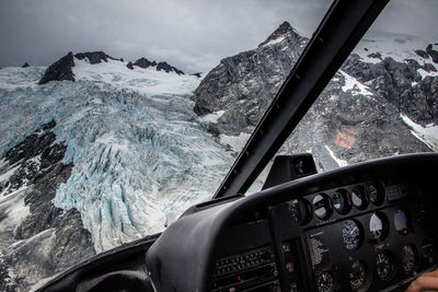 Mountain seen through helicopter during winter