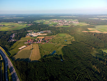 Aerial view of agricultural field against sky