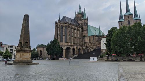 Historic building against sky in city