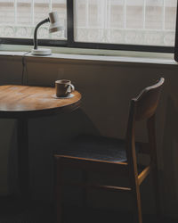 Empty chairs and table at home