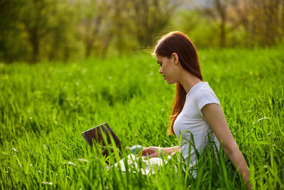 Young woman using mobile phone