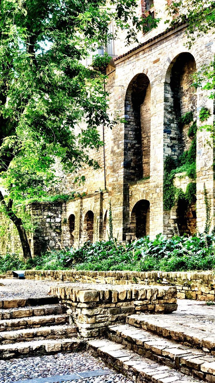 OLD RUINS AGAINST BUILDING