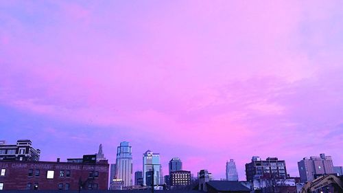 Skyscrapers in city against sky