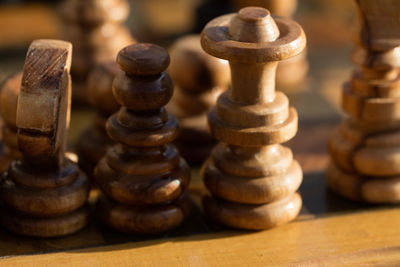 Close-up of chess pieces on table