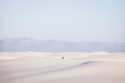 A man is taking selfie in white sands national park