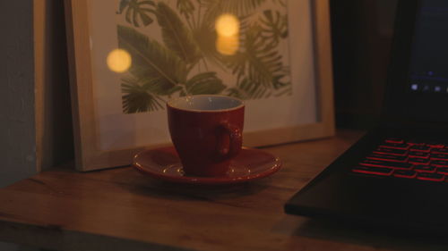 Coffee cup on table at home