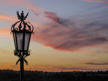 Close-up of silhouette plant against sky during sunset