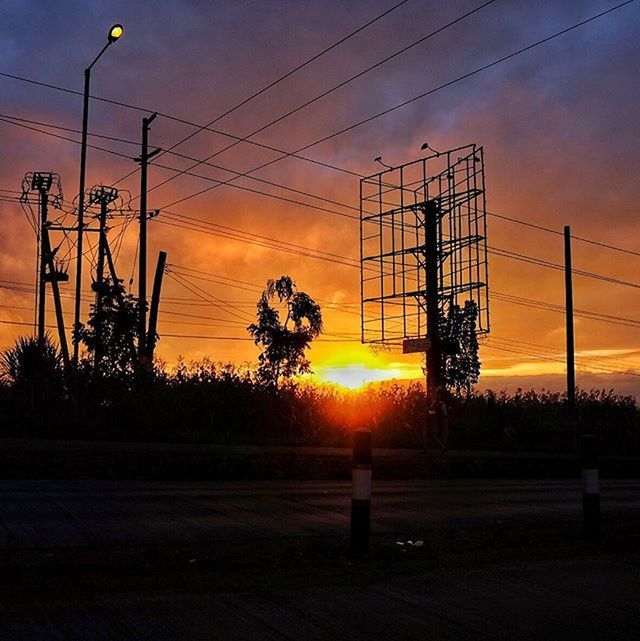 sunset, electricity pylon, orange color, power line, silhouette, power supply, electricity, sun, sky, connection, fuel and power generation, cable, sunlight, power cable, transportation, technology, nature, tree, cloud - sky, beauty in nature