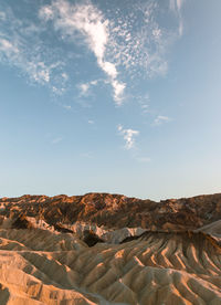 Scenic view of rock formations against sky