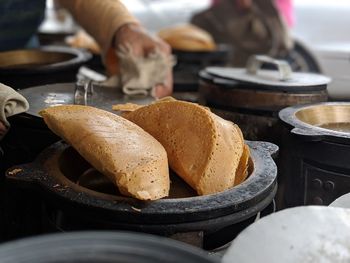 Close-up of person preparing food