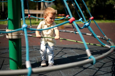 Portrait of boy playing in playground