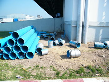 Stack of pipes on land